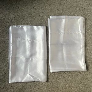 2 standard white silk pillowcases: Brand new.